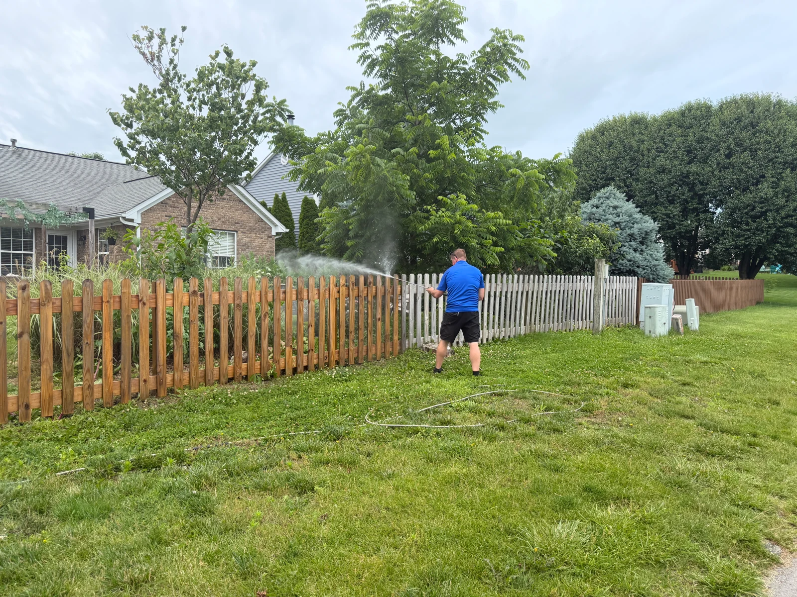 Picket Fence Cleaning Before Staining at an Arorix customer project