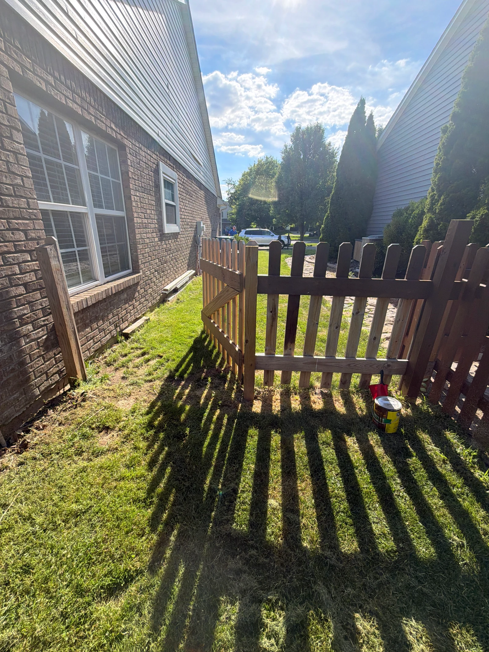 Picket Gate Staining in Progress at an Arorix customer project