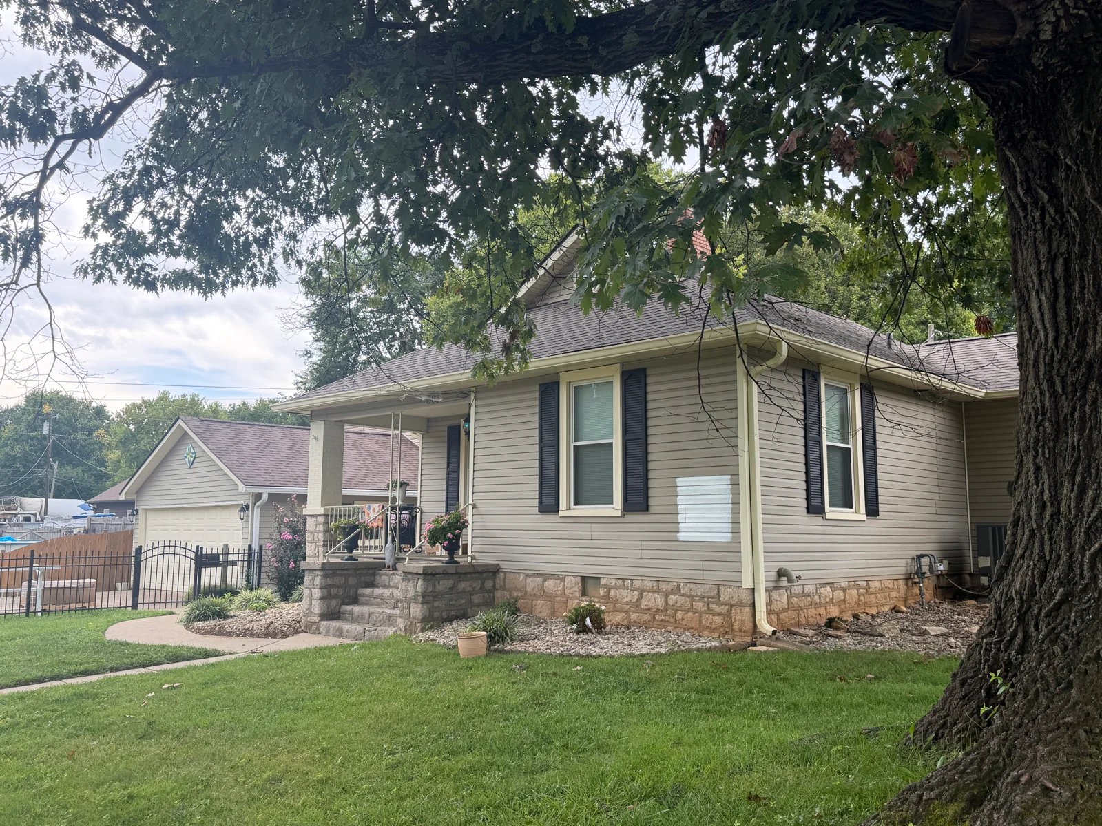 Front Corner — Paint Sample and Preparation on a house repaint by Arorix Home Solutions