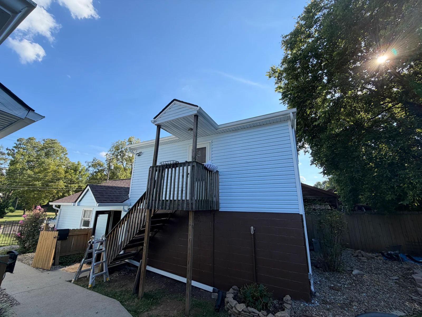 Upper Exterior and Foundation — After Repainting on a house repaint by Arorix Home Solutions