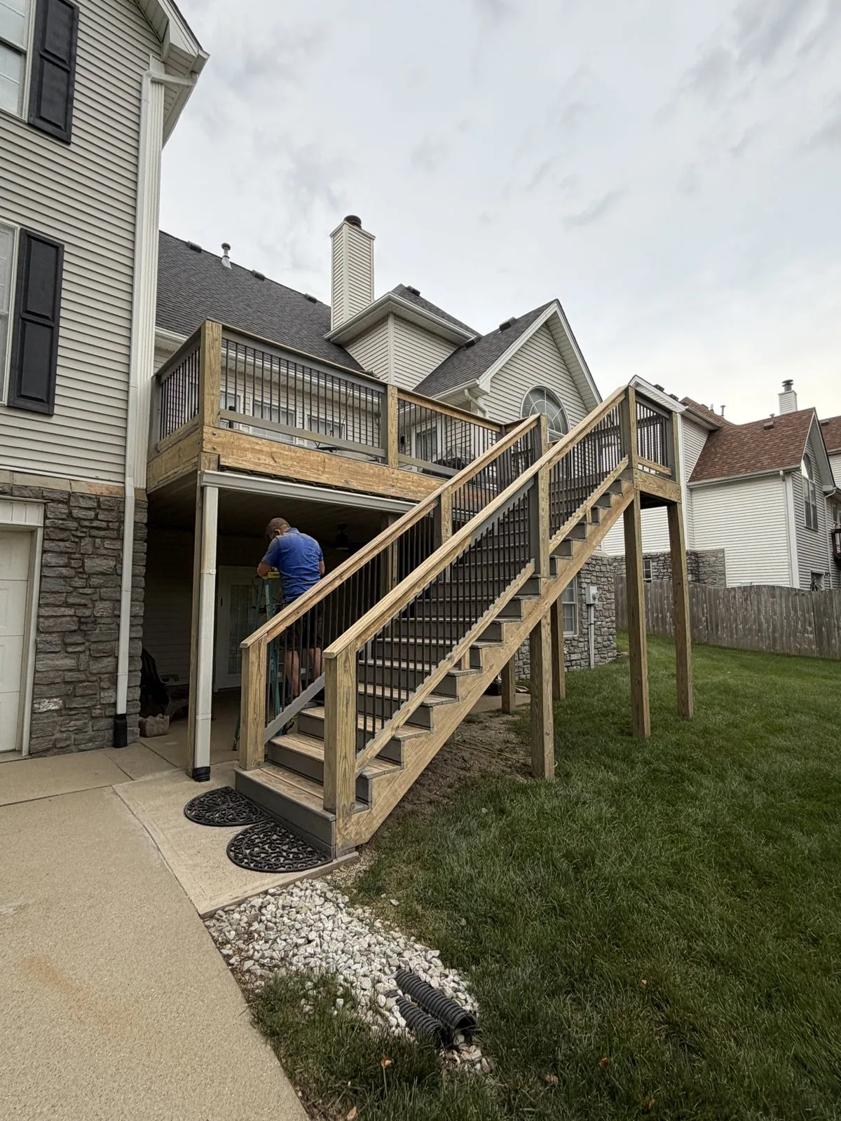 Wood deck sanded and prepared for painting by Arorix Home Solutions