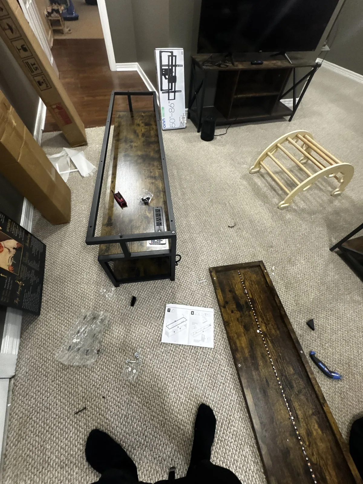 Furniture parts organized for assembly by Arorix Home Solutions in Lexington Kentucky