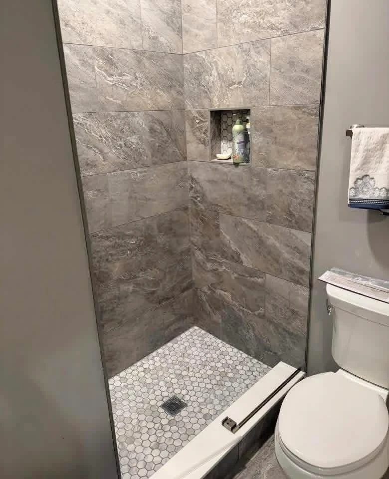 Tiled shower opening before installation of the glass door