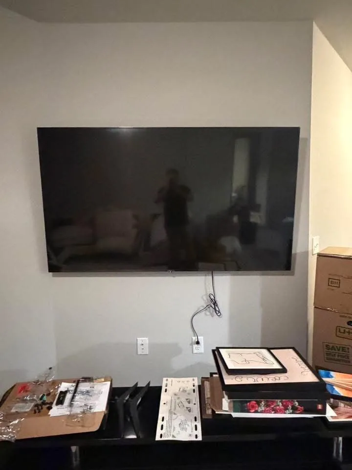 Wall-mounted television installed by Arorix Home Solutions in a Lexington living room